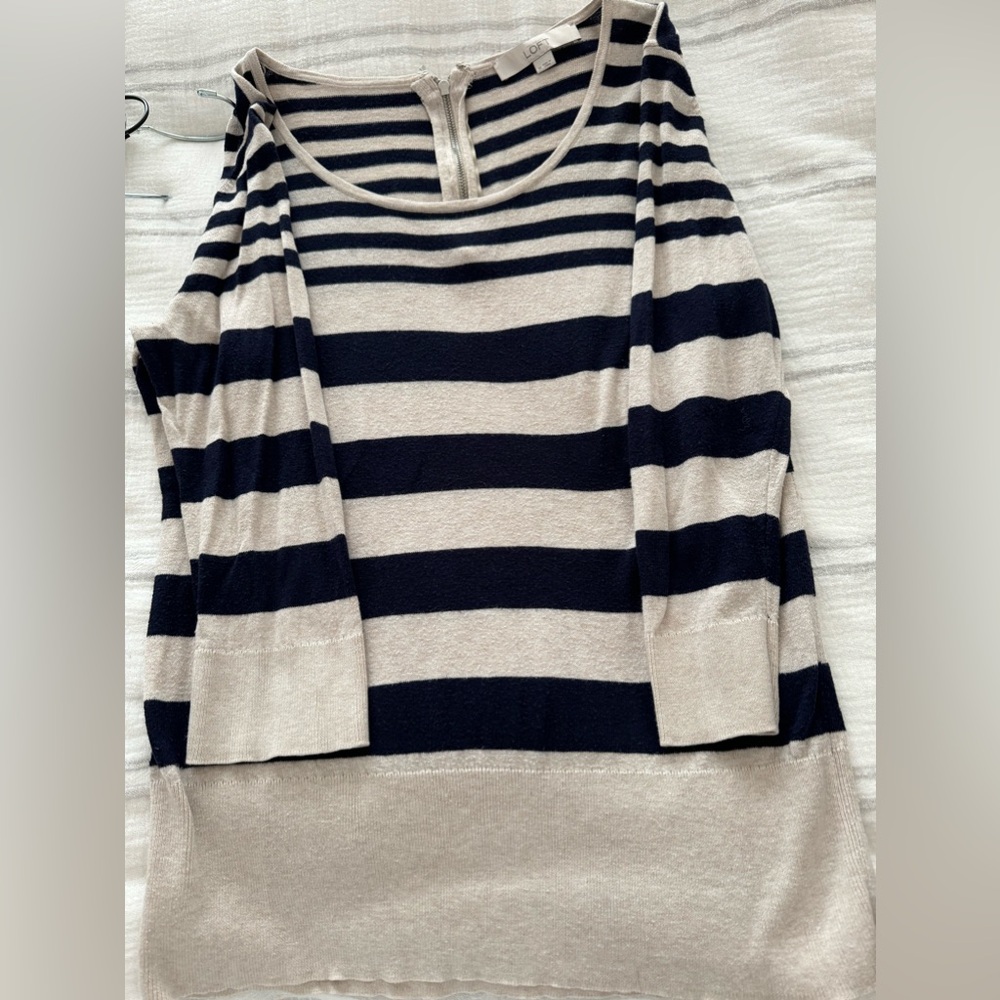 3/4 length sleeve, light sweater, zipper in back, size medium